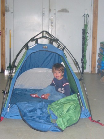 Loyal customer Sam Davidson testing out a tent for his dog.